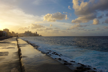 Colroful sunset at Malecon, the famous Havana promenades in Havana, Cuba