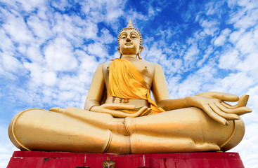 Fototapeta na wymiar big beautiful buddha statues against the sky,THAILAND