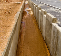 Drainage way concrete roadside drain water used for drainage in case of flooding.