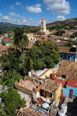 Colorful skyline with mountains and colonial houses. The village is a Unesco World Heritage and major tourist landmark on the Caribbean Island, Trinidad de Cuba
