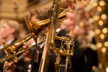 trumpet section during a classical concert music, close-up. - obrazy, fototapety, plakaty