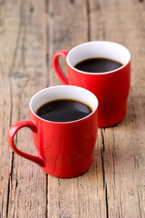 Two Red Cups of Black Coffee Old Wooden Background Tasty Americano Vertical