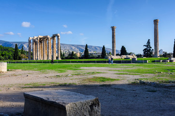 Athens, Attica / Greece.The Temple of Olympian Zeus also known as the Olympieion or Columns of the Olympian Zeus at the center of Athens city. Sunny day, blue cloudy sky, panoramic view