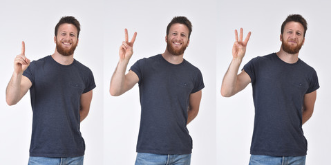 man counting with fingers from one to three