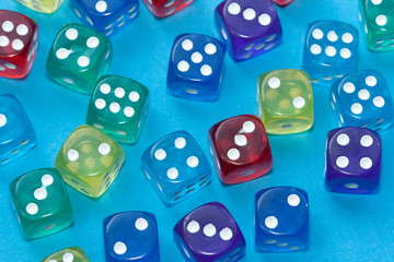 Gaming dices on blue background.
