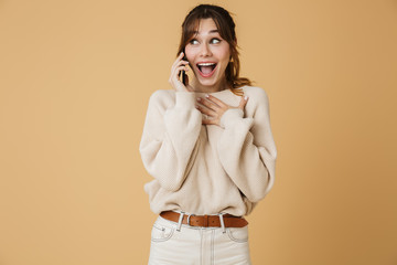 Beautiful young woman wearing sweater standing