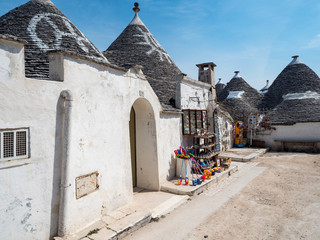 Alberobello, Puglia, Italy: Typical houses built with dry stone walls and conical roofs of the...