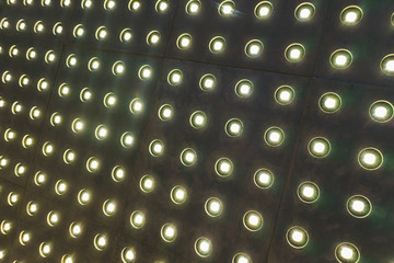 Abstract background of blurry lighting lamps.