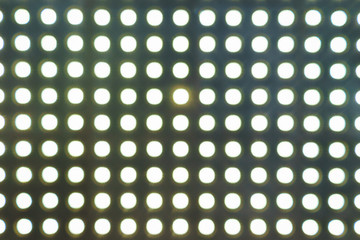 Abstract background of blurry lighting lamps.