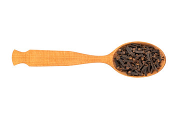Dry cloves in spoon
