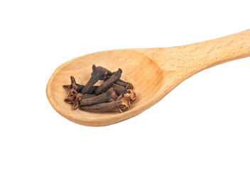 Dry cloves in spoon