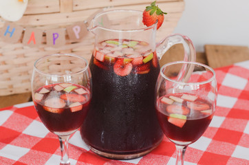 Jug and glasses of sangria. Drink for the summer.