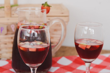 Jug and glasses of sangria. Drink for the summer.