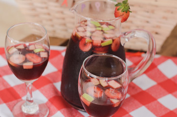 Jug and glasses of sangria. Drink for the summer.