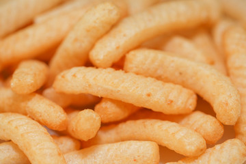 Closeup Shrimp cracker chips on a white paper plate. - Image