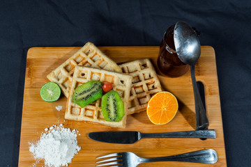 Waffles de limón y naranja para el desayuno