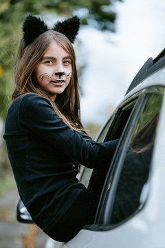 Girl in a cat's costume at Halloween