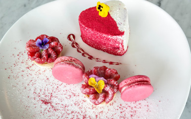 Heart shaped strawberry cake with pink macaroons - cheesecake love desserts