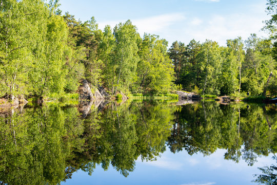 Beautiful summer view to the pond beside old iron works area in Taalintehdas (Dalsbruk), Finland