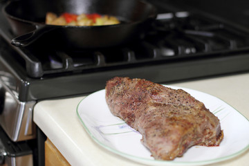 Sirloin tritip steak on a plate.