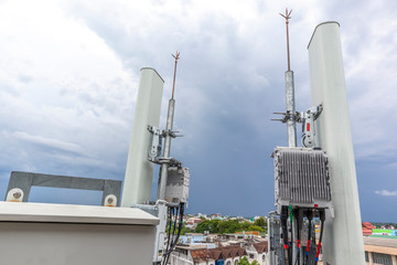 5G smart mobile telephone radio network antenna base station. Transmitter connection system at cellular phone antennas.