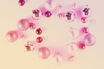 Christmas decorations on pink