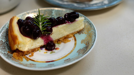 A piece of blueberry cheesecake