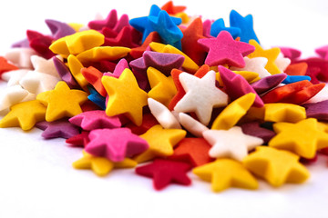 Colorful bright background, multi-colored stars. Sweet nice background candy.