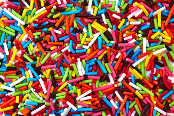 Fototapeta na wymiar Colorful bright background, multi-colored sticks. Sweet nice background candy.