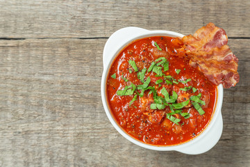 Tomato soup with bacon. The view from the top. Copy-space.