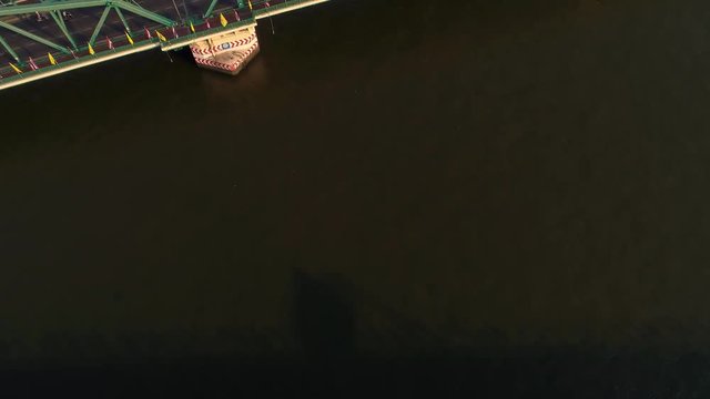 Aerial view of Bangkok downtown,Traffic at the Phra Phuttha Yodfa Bridge and Phra Pok Klao Bridge ,Chao Phraya River In the morning.