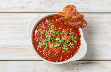 Tomato soup with bacon. The view from the top. Copy-space.