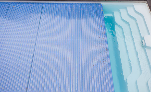 Swimming pool cover detail for protection and heat the water, pool roller-shutter covers