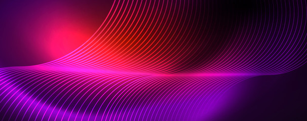 Shiny neon lights, dark abstract background with blurred magic neon light curved lines