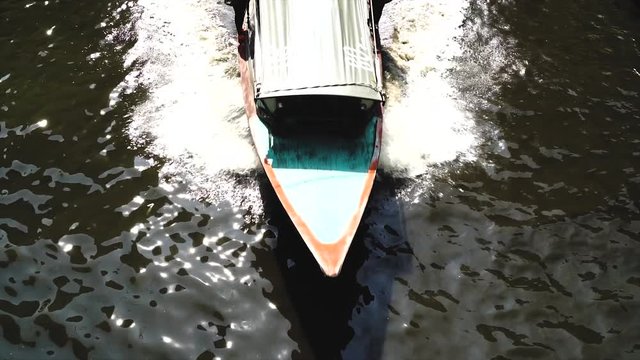 Saen Saep canal passenger boat, in Bangkok, the capital city of Thailand, atmosphere at noon.