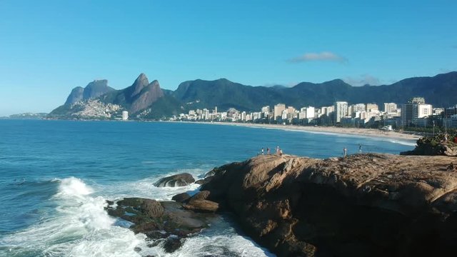 Flying above Ipanema Beach and Arpoador stone in Rio de Janeiro, Brazil