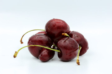 Red cherry fruit isolated on white background