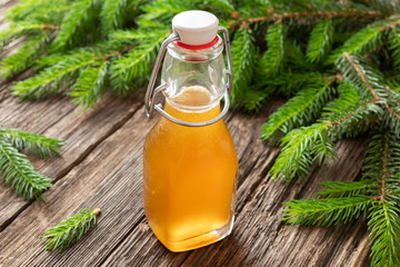 Syrup made from young spruce tips in a bottle