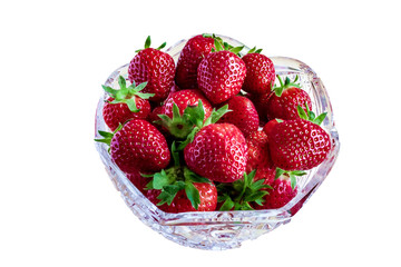 Red ripe garden berry strawberry in deep crystal clear plate, dish, bowl, saucer, bowl, dish, isolate