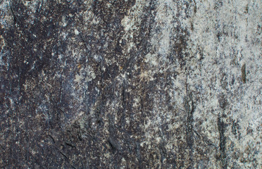 Dark background. The texture of the stone. Natural background