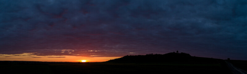 Arial Motion clouds sunset field