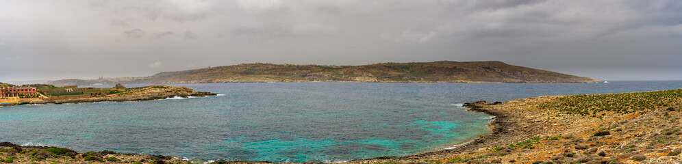 Pure crystal turquoise water of Blue Lagoon in Comino Malta