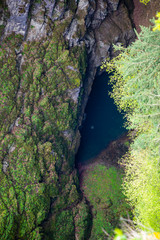 The Macocha Abyss with lake, sinkhole in the Moravian Karst cave system, Czech Republic