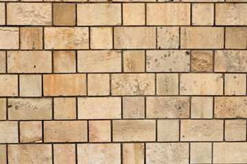 Big yellow wall from stone bricks