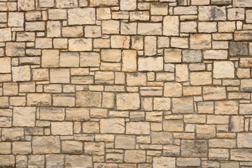 Big yellow wall from stone bricks