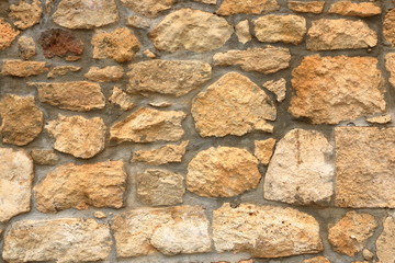 Big yellow wall from stone bricks