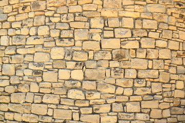 Big yellow wall from stone bricks