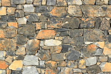 Big gray wall from stone bricks