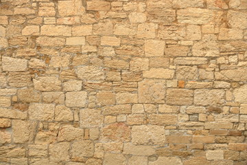 Big yellow wall from stone bricks
