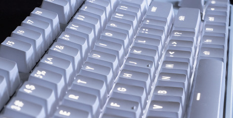 white LED glowing mechanical keyboard - close up